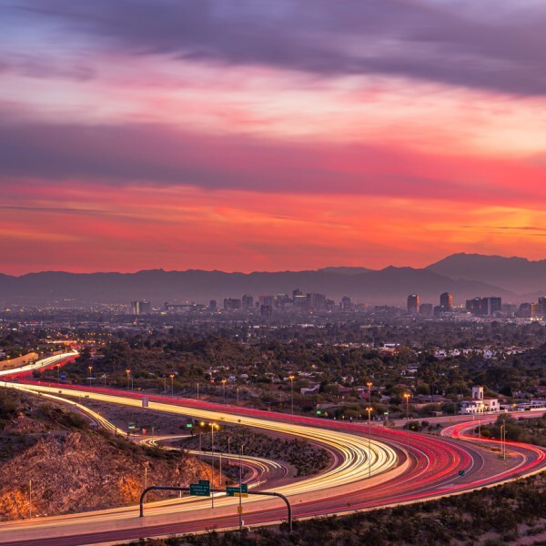 skyline of a city at sunset